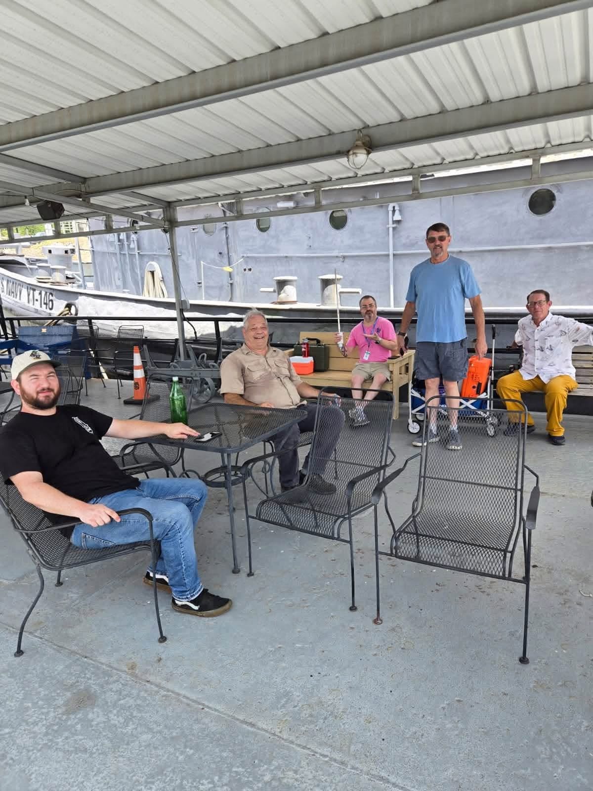 Crew on deck of the USS YT-146 at MSWE 2026
